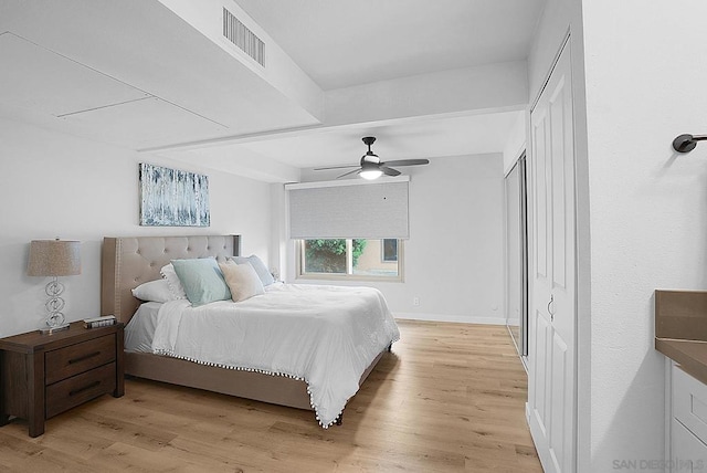 bedroom with ceiling fan and light hardwood / wood-style flooring