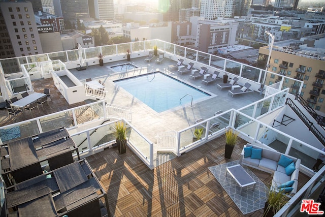 view of swimming pool with a patio area