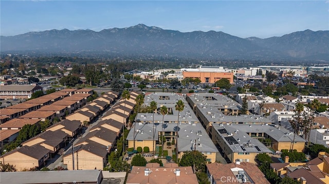 birds eye view of property featuring a mountain view