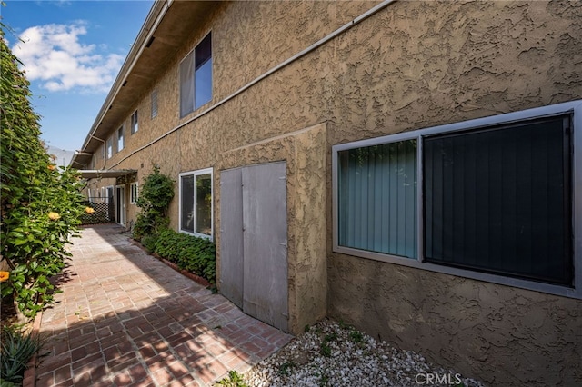 view of home's exterior featuring a patio area