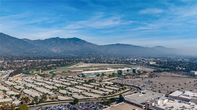 drone / aerial view featuring a mountain view