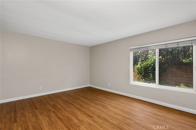 empty room featuring light hardwood / wood-style floors