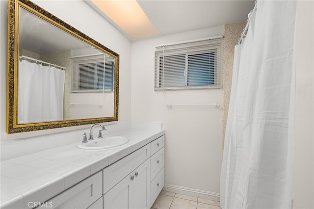 bathroom with vanity and tile patterned flooring