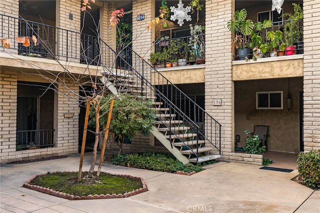 property entrance featuring a patio area