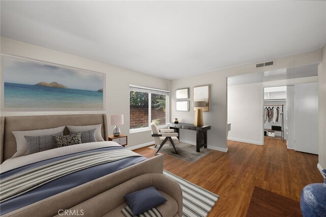 bedroom featuring a closet and hardwood / wood-style floors