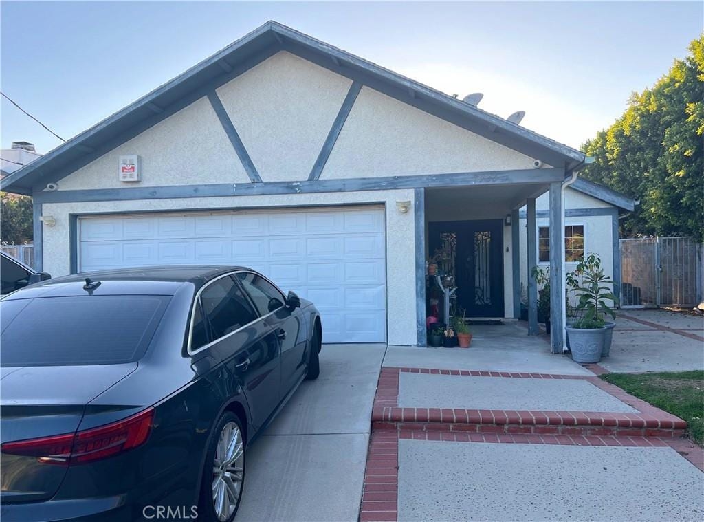 7923 Van Noord Ave, North Hollywood, CA 91605 - view of front of home with a garage