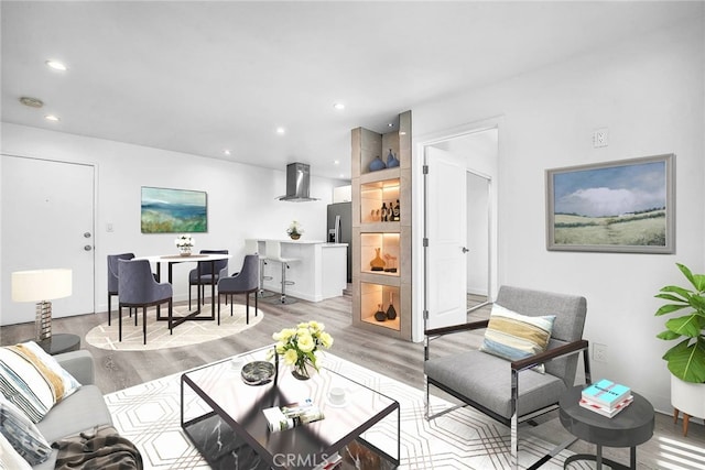 living room with light hardwood / wood-style floors