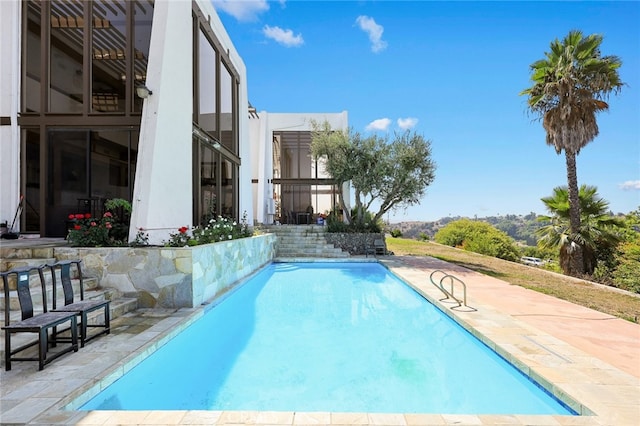 view of pool with a patio area