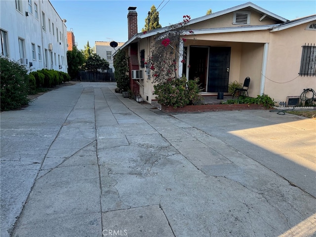 view of property exterior with cooling unit