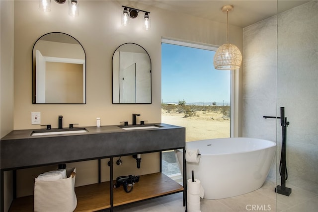 bathroom with shower with separate bathtub, tile patterned flooring, and vanity