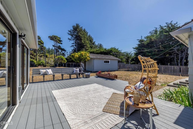 wooden terrace with a storage unit