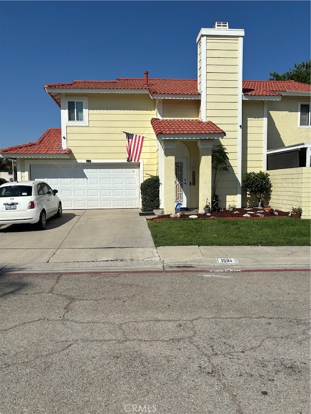 view of front of property with a garage