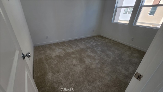 view of carpeted spare room