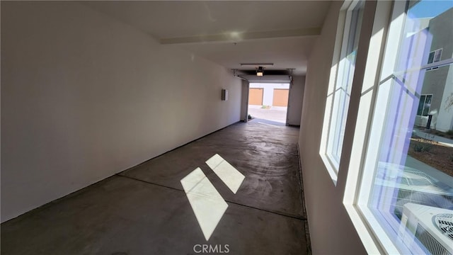 corridor featuring concrete floors