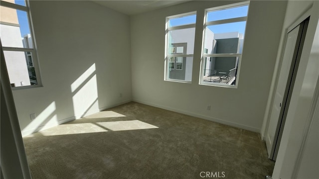 view of carpeted spare room