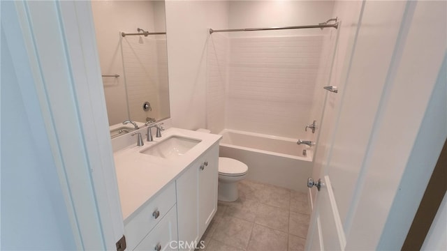 full bathroom featuring  shower combination, vanity, tile patterned flooring, and toilet