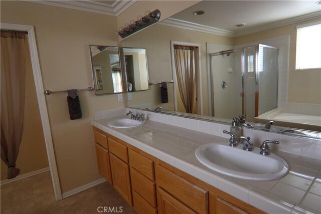 bathroom featuring vanity, shower with separate bathtub, crown molding, and tile patterned flooring