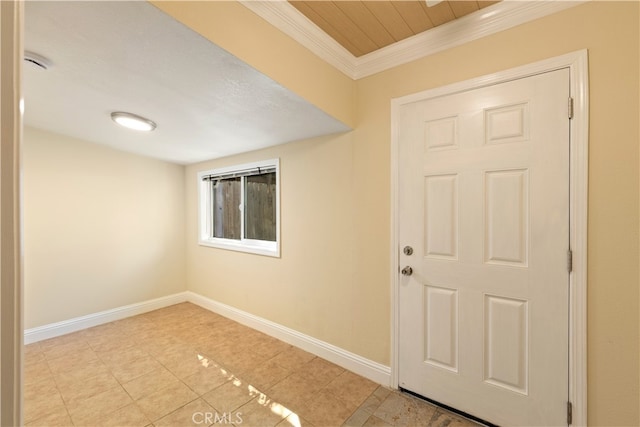 entryway featuring light tile patterned flooring and crown molding