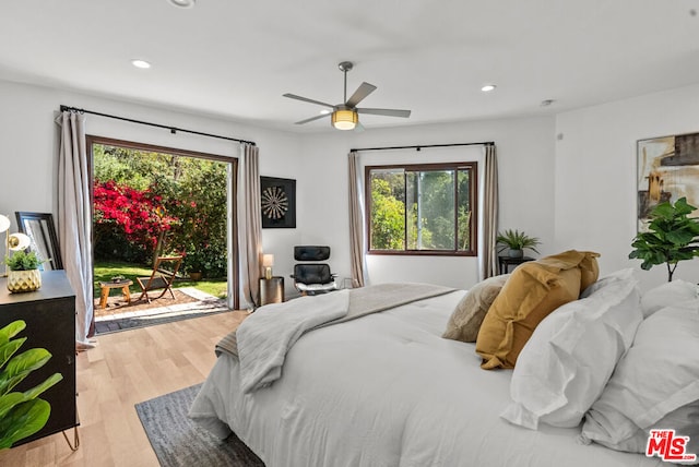 bedroom with ceiling fan, light hardwood / wood-style floors, and access to outside