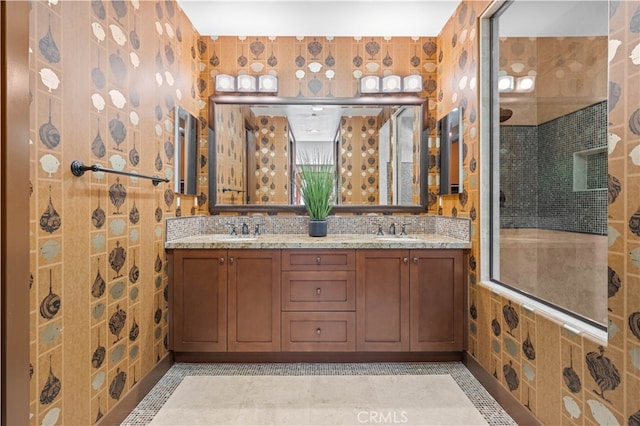 bathroom featuring vanity, tile patterned flooring, and an enclosed shower