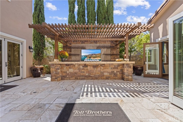 view of patio / terrace with a pergola