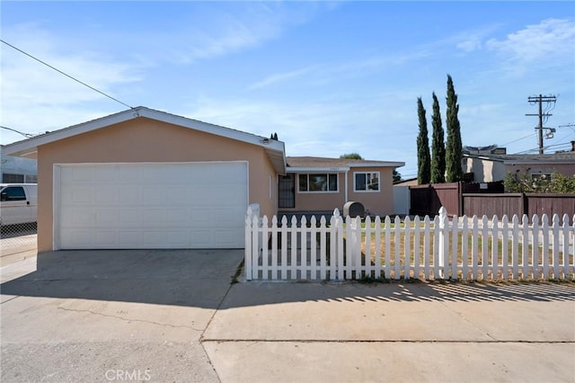 ranch-style home with a garage