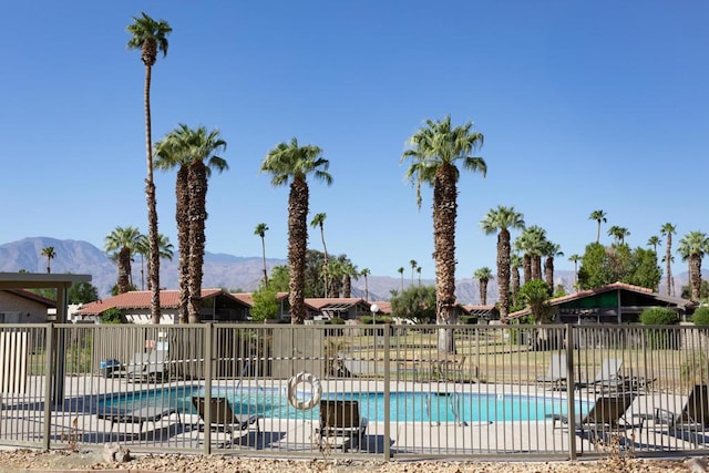 view of pool with a mountain view