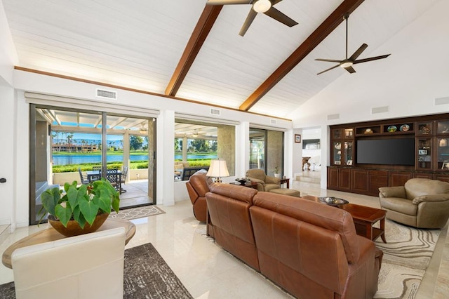 tiled living room featuring ceiling fan, a water view, beam ceiling, and high vaulted ceiling