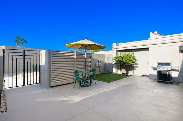 view of patio / terrace with a grill