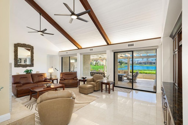 living room with ceiling fan, light tile patterned floors, beam ceiling, and high vaulted ceiling