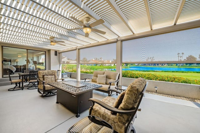 view of patio featuring a pergola, an outdoor living space with a fire pit, and ceiling fan