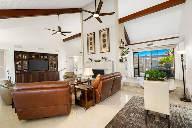 tiled living room with high vaulted ceiling, beam ceiling, and ceiling fan