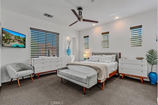 carpeted bedroom with ceiling fan