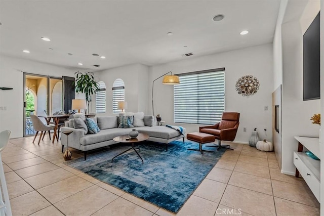 living room with light tile patterned floors