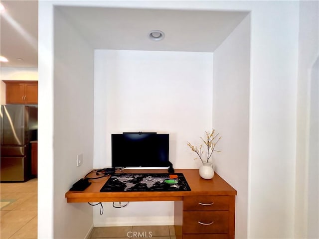 office space featuring light tile patterned floors