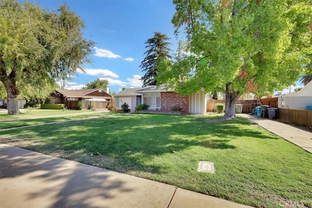 view of front of property with a front lawn