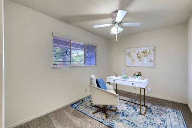 office area with ceiling fan and carpet