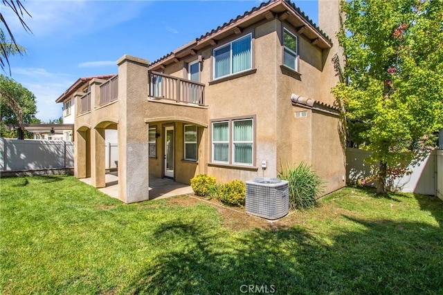 35375 Trevino Trl, Beaumont, CA 92223 - rear view of property with a balcony, central AC, stucco siding, a patio area, and a tiled roof