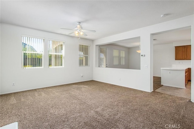 35375 Trevino Trl, Beaumont, CA 92223 - carpeted spare room featuring a ceiling fan, baseboards, and a smoke detector