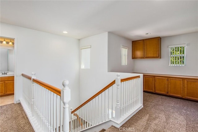 35375 Trevino Trl, Beaumont, CA 92223 - corridor featuring an upstairs landing, light colored carpet, and recessed lighting
