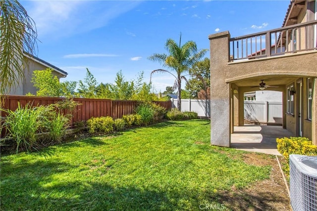 35375 Trevino Trl, Beaumont, CA 92223 - view of yard featuring ceiling fan, central AC unit, a patio, and a balcony