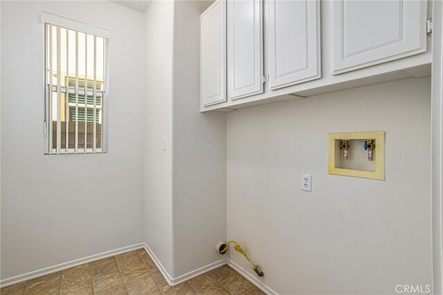 35375 Trevino Trl, Beaumont, CA 92223 - washroom with baseboards, cabinet space, and washer hookup