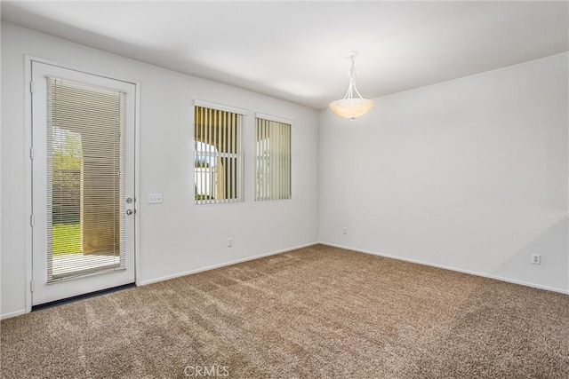 empty room featuring carpet floors