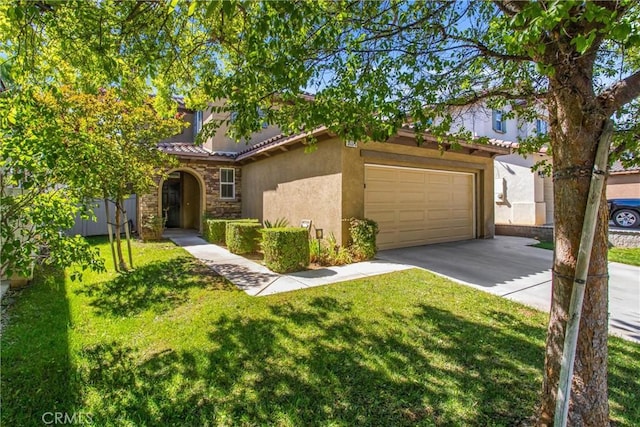 35375 Trevino Trl, Beaumont, CA 92223 - view of front of house featuring stucco siding, concrete driveway, a tiled roof, stone siding, and a front yard