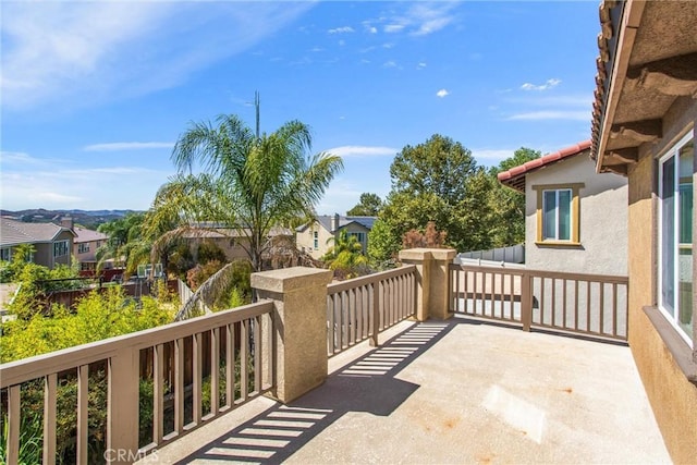 view of patio / terrace with a balcony