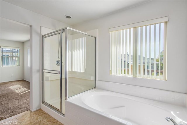 35375 Trevino Trl, Beaumont, CA 92223 - full bathroom with a bath, a stall shower, and tile patterned flooring