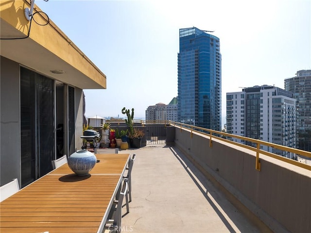 view of patio / terrace with a balcony