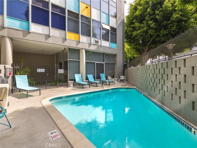 view of pool featuring a patio area