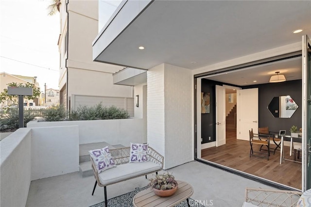 view of patio with a balcony