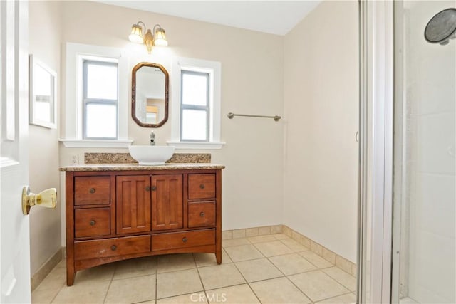 bathroom featuring tile patterned floors and vanity